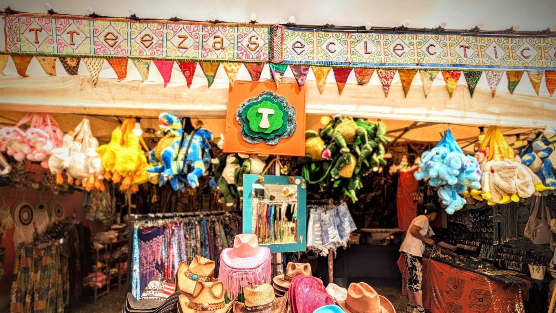 Colorful store interior with various items and a decorative banner.
